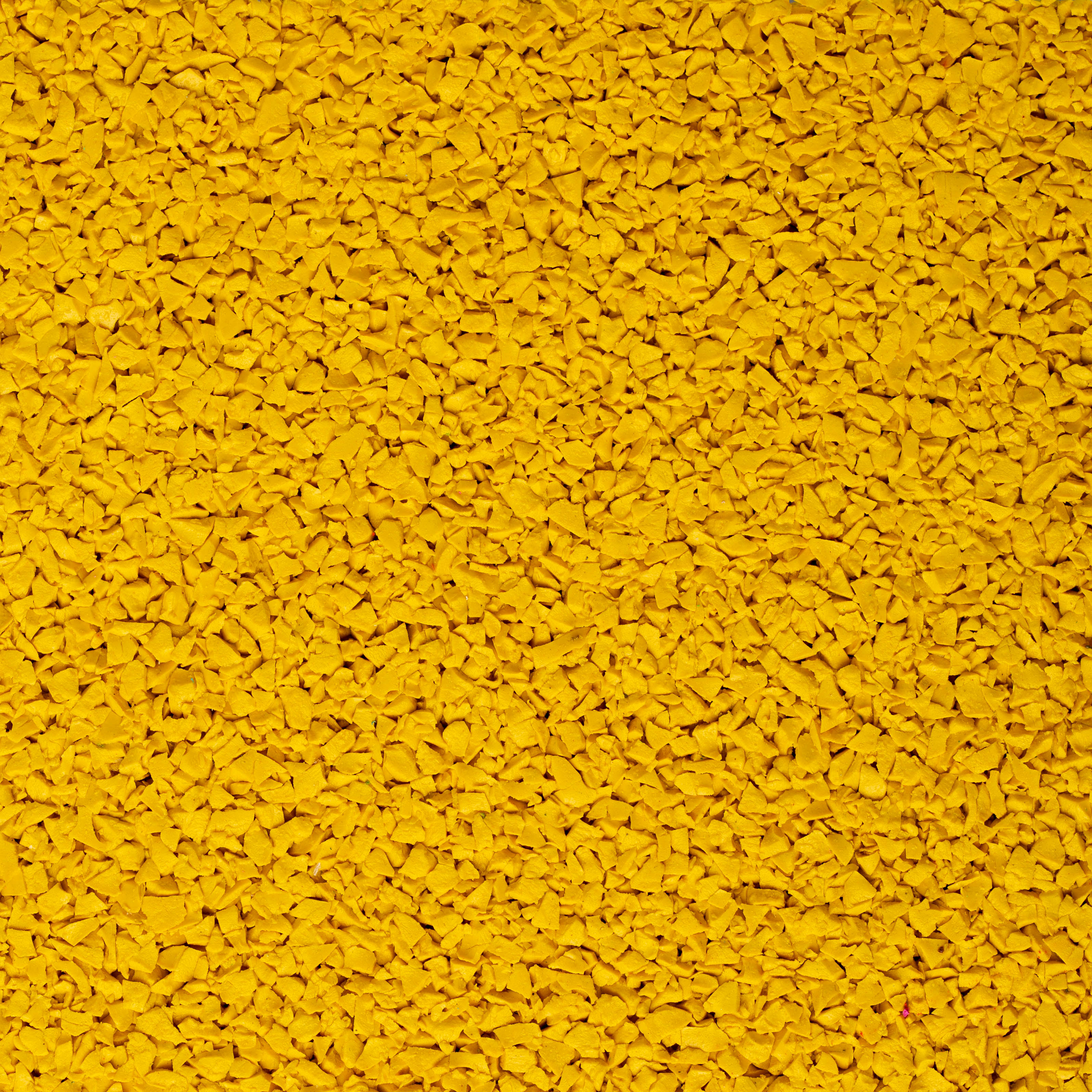 Sistema de color amarillo de gr&aacute;nulos de caucho EPDM